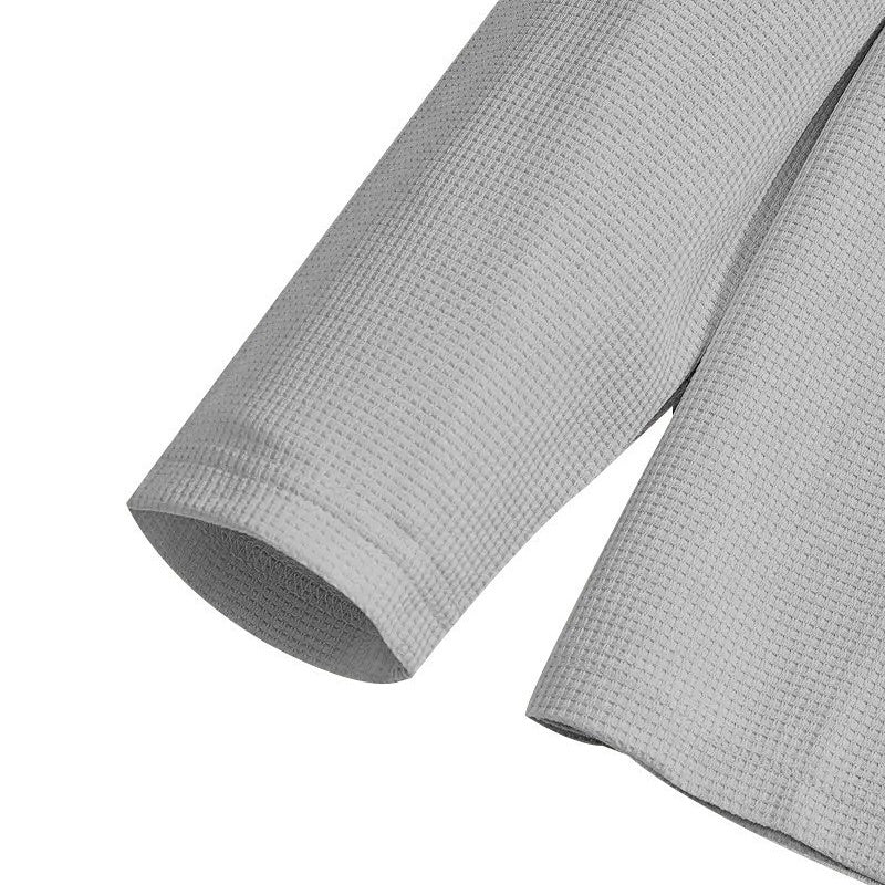 Conjunto compuesto por sudadera con tejido de punto gofrado y pantalones de pierna recta.